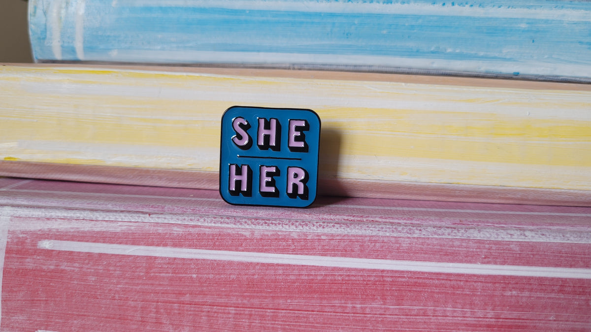 Pin: She/Her Blue